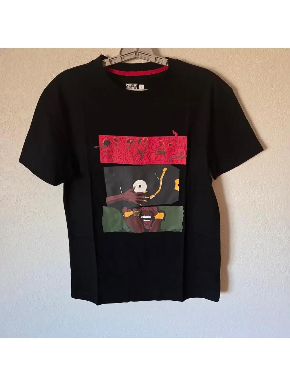 Black History Month Tee with graphic of a person playing a record player